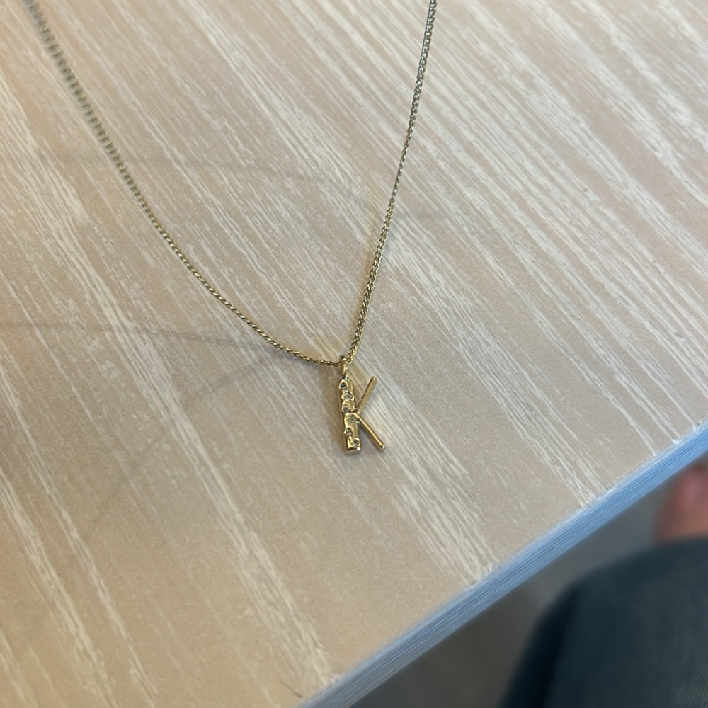 Gold color K initial charm necklace with crystals
